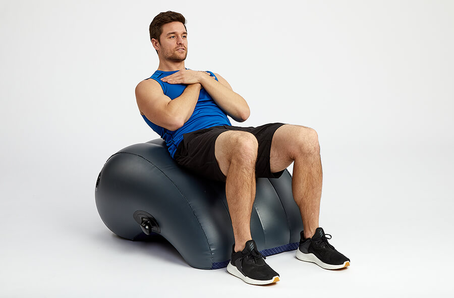 Man performing crunch with Aerotrainer