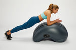Woman performing plank with Aerotrainer